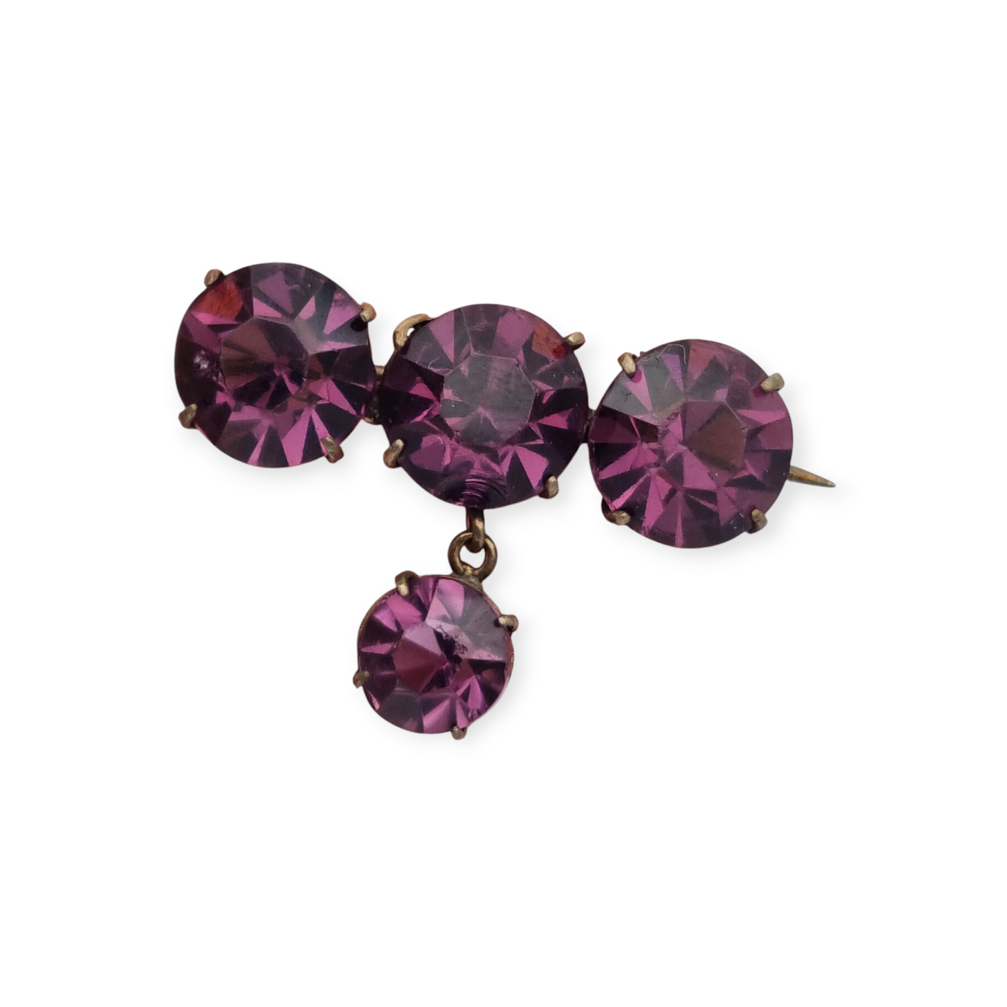 Antique brass brooch with faceted purple rhinestone pendant, circa 1930