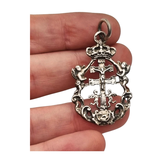 Sterling silver religious pendant with Caravaca cross and cherubs circa 1970-80