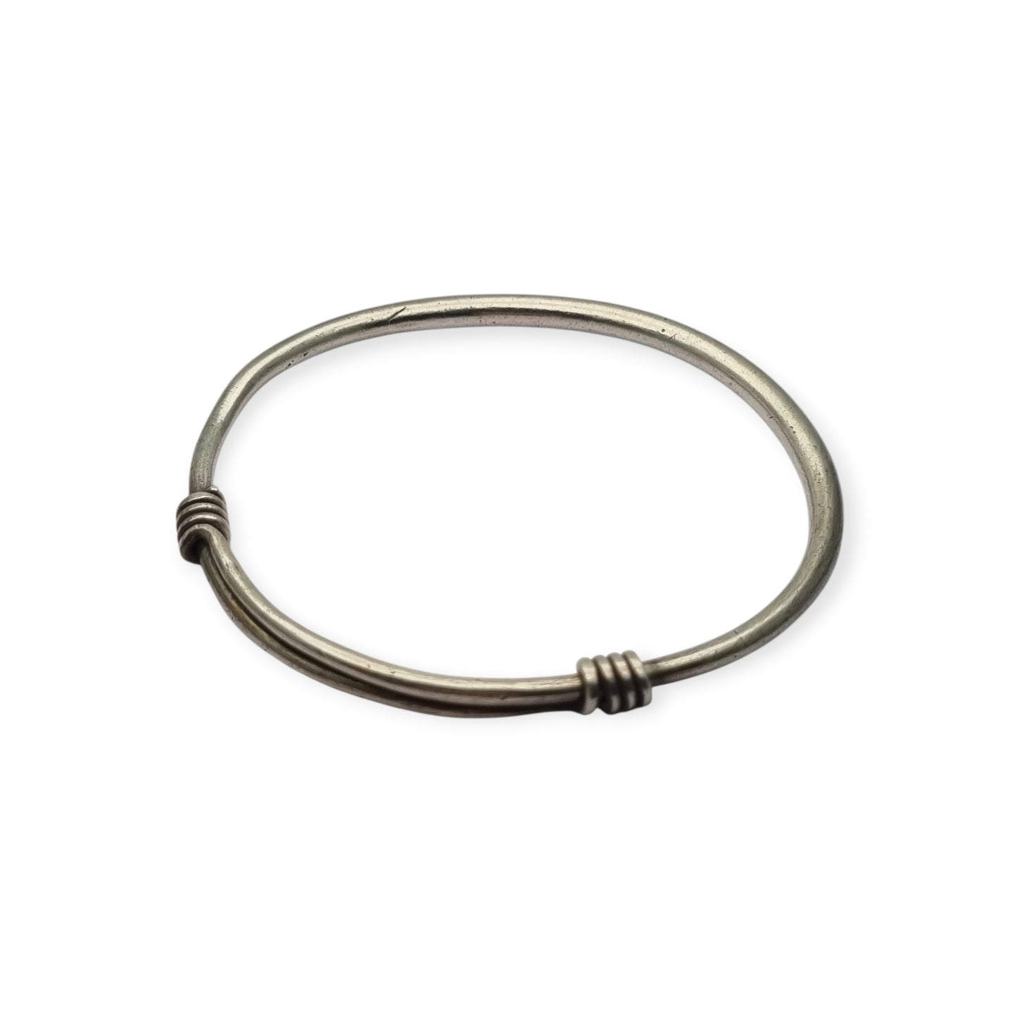 Vintage ethnic silver African knot bracelet, rigid artisan tribal bangle, 20th century