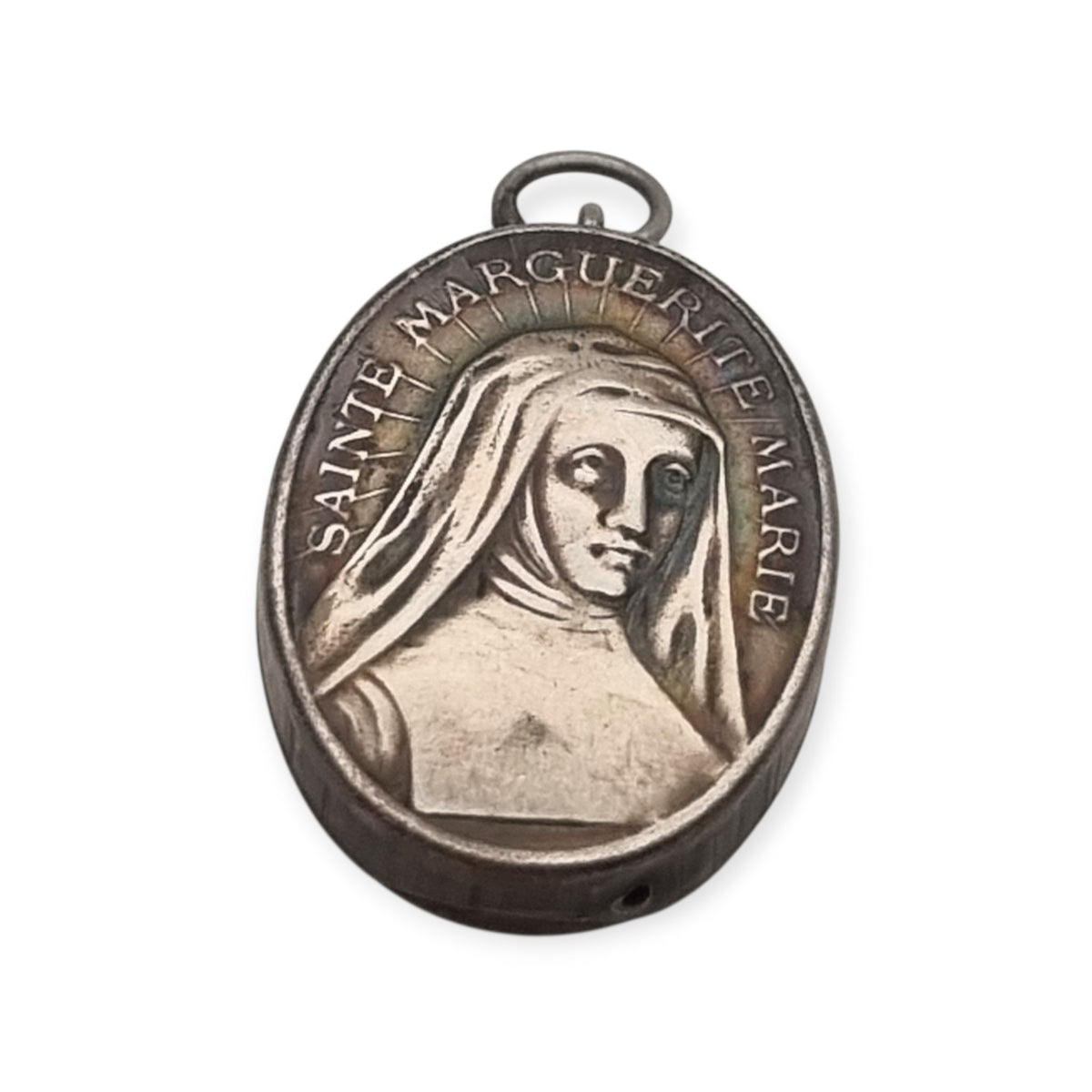 Antique silver reliquary containing a relic of Saint Margaret Mary Alacoque, engraved frame · France, ca. 1920–1940
