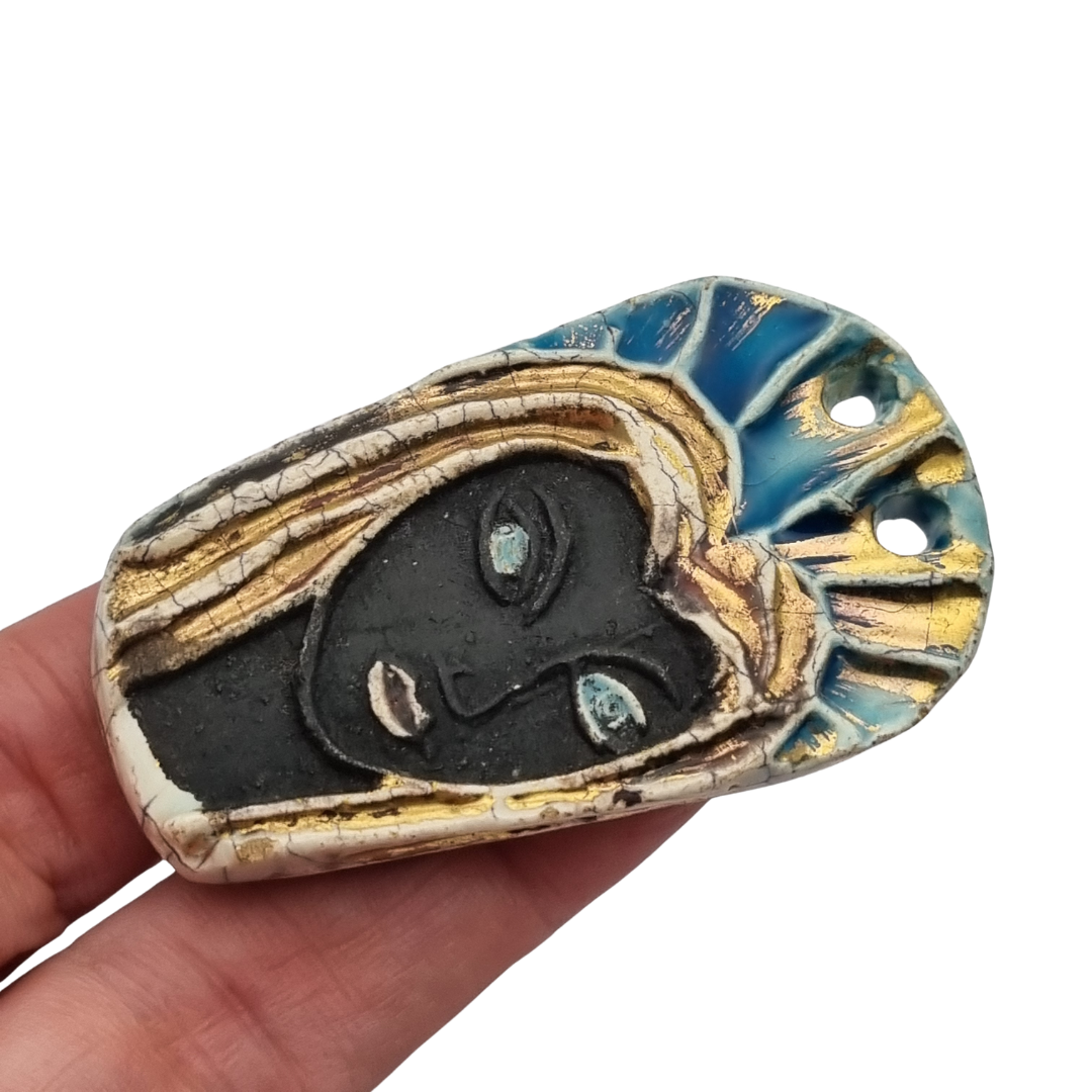 Handmade ceramic pendant with a Modernist Marian bust, enameled piece with golden highlights, European, 1960–1980s