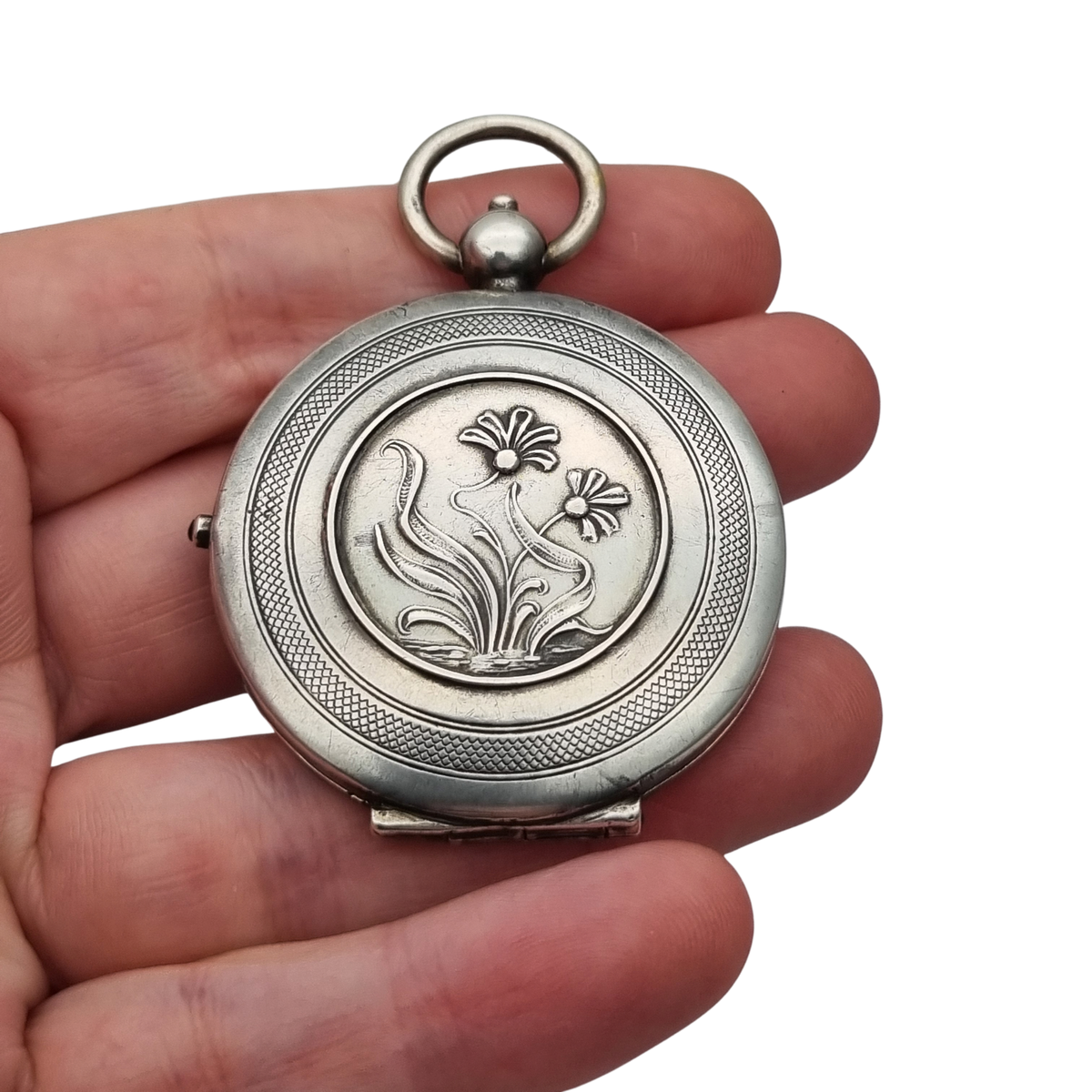 Antique Art Nouveau 800 silver locket with double photo frame, floral engraving, and pink stone, ca. 1900