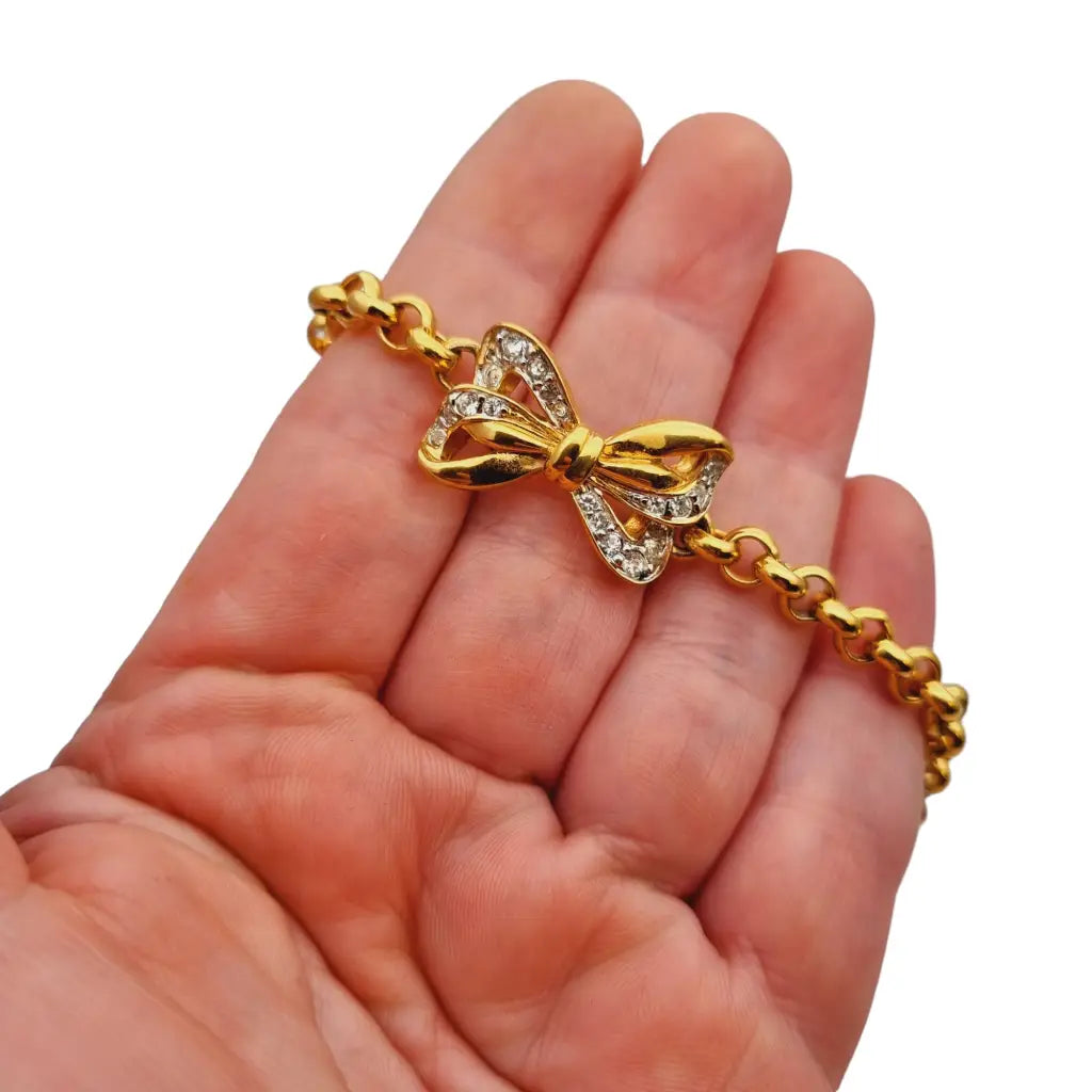 Pulsera vintage dorada de nina ricci lazo con cristales regalos para mujer.