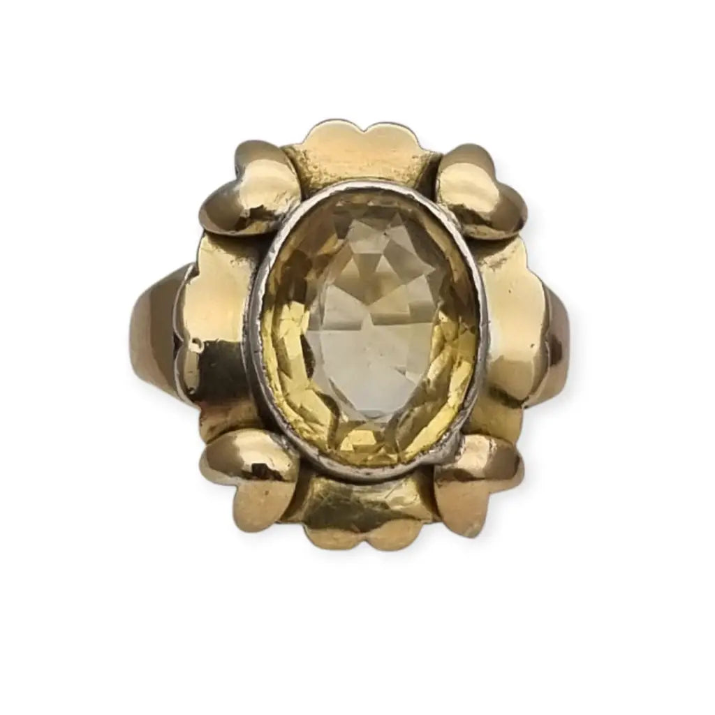 Anillo Art Déco en plata y oro con gema de efecto citrino circa 1940 escuela