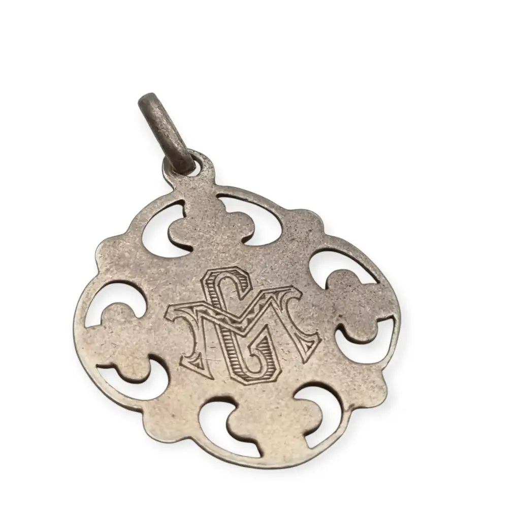 Antiguo colgante religioso en plata y dorado cáliz eucarístico circa 1900.