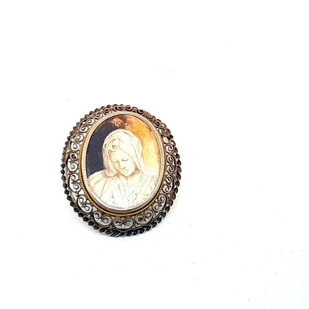 Vintage Virgin Mary brooch or pendant. Stamped outlet 800