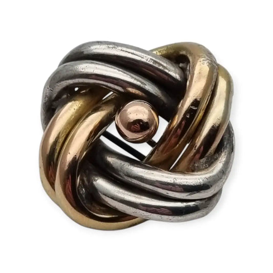 Broche antigua de nudo amor en plata años 40 con diseño simbólico