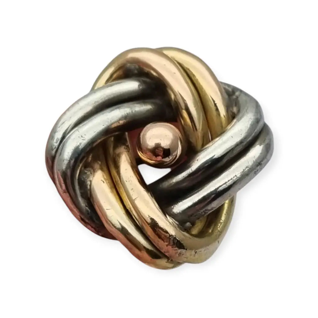 Broche antigua de nudo amor en plata años 40 con diseño simbólico