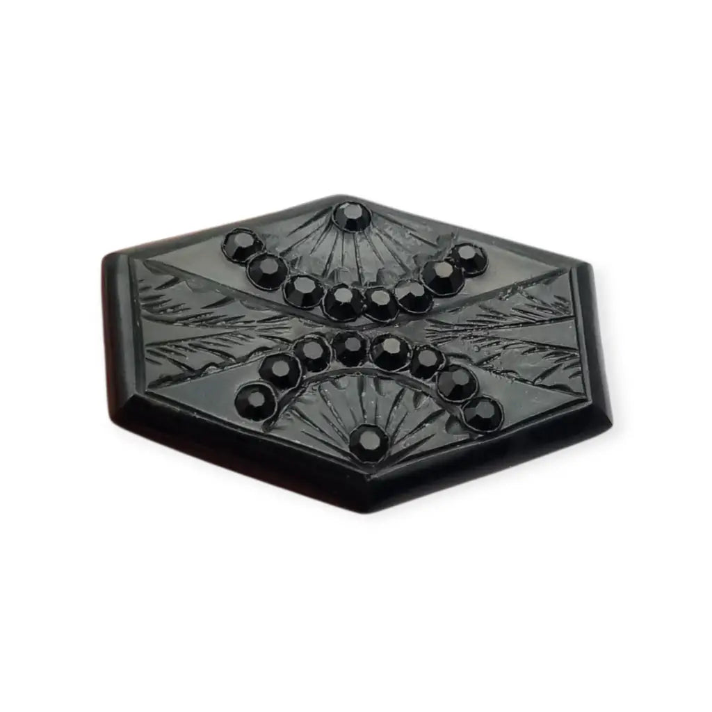 Broche art déco en baquelita negra tallada con strass forma hexagonal circa