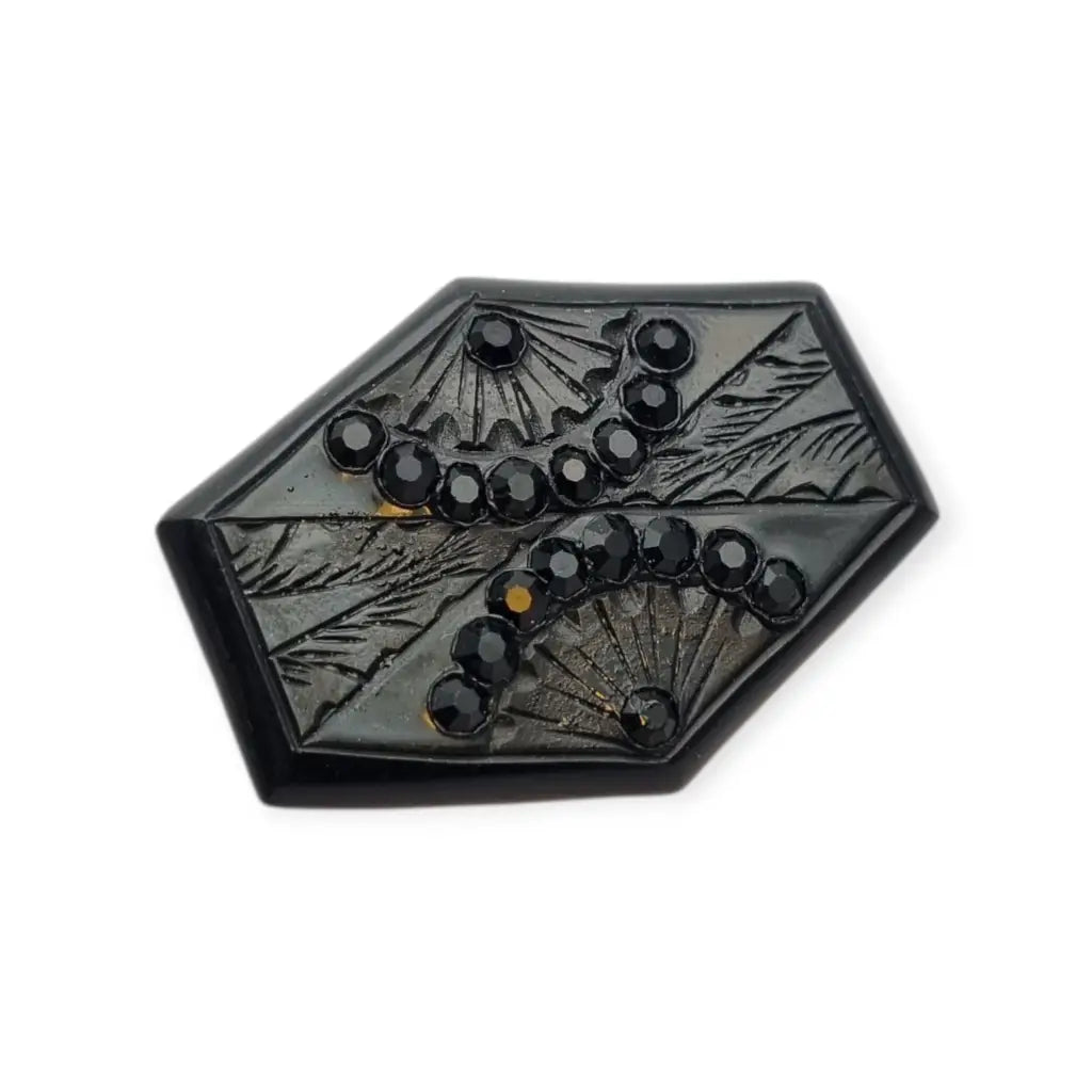 Broche art déco en baquelita negra tallada con strass forma hexagonal circa