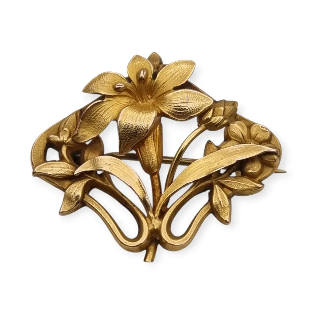 Broche Art Nouveau años 1910‑20 en metal dorado motivo floral. LaBizarreSusu