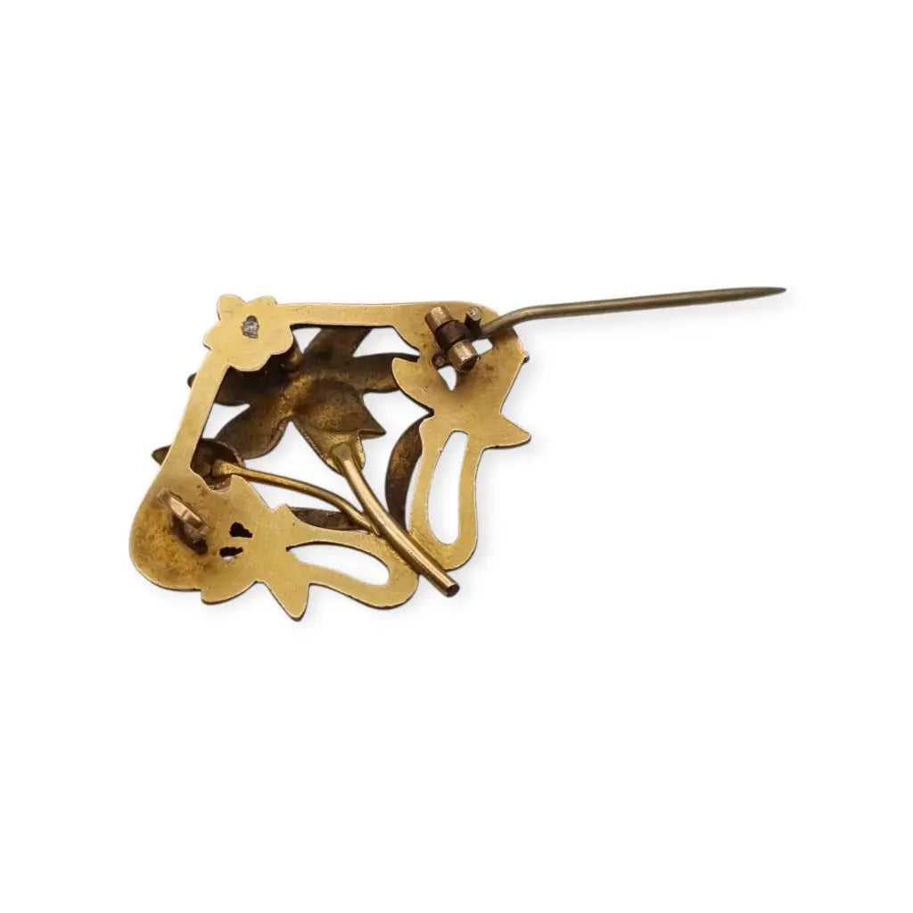 Broche Art Nouveau años 1910‑20 en metal dorado motivo floral. LaBizarreSusu