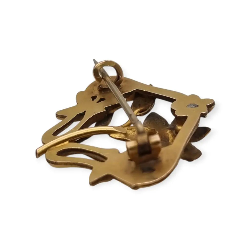 Broche Art Nouveau años 1910‑20 en metal dorado motivo floral. LaBizarreSusu