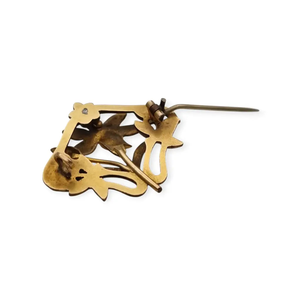 Broche Art Nouveau años 1910‑20 en metal dorado motivo floral. LaBizarreSusu