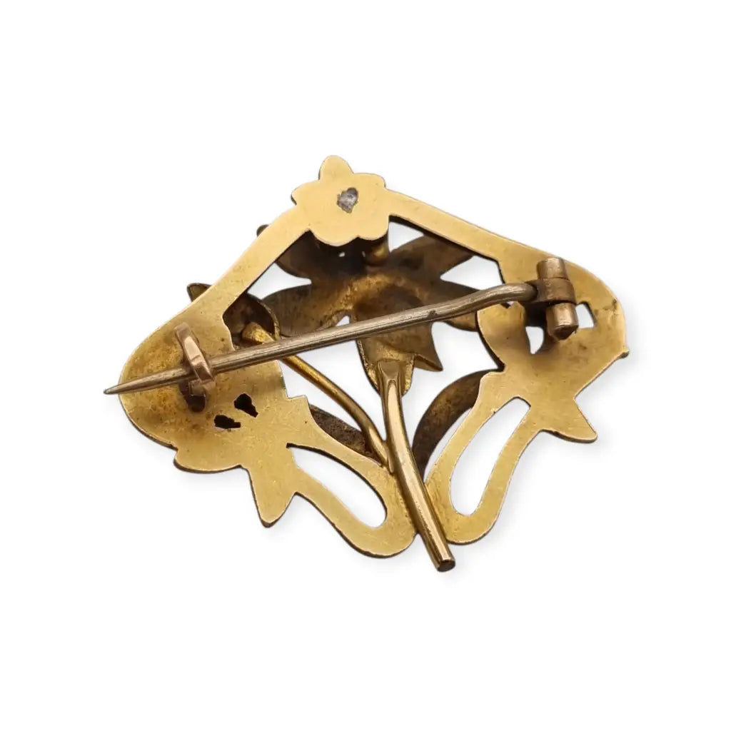 Broche Art Nouveau años 1910‑20 en metal dorado motivo floral. LaBizarreSusu