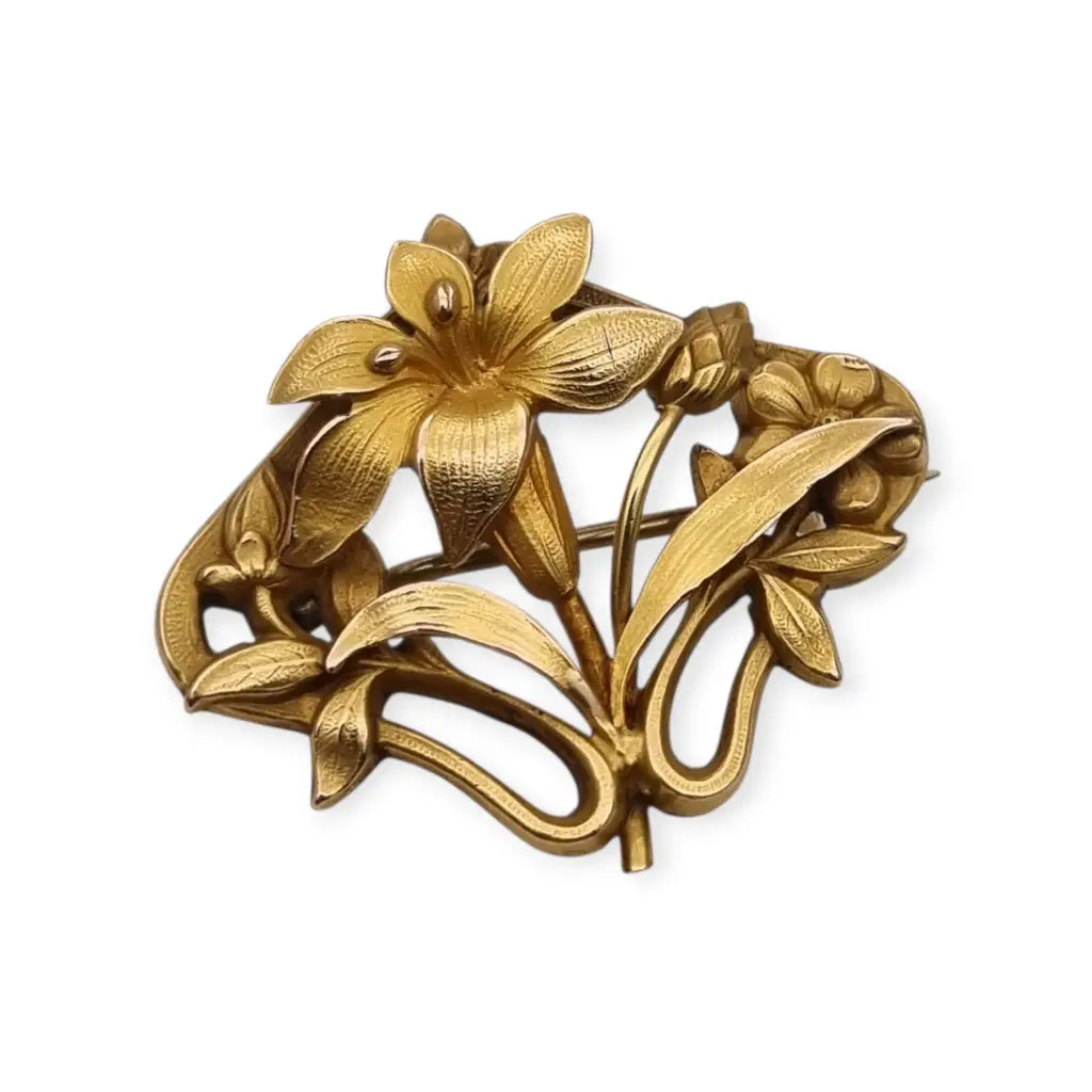 Broche Art Nouveau años 1910‑20 en metal dorado motivo floral. LaBizarreSusu
