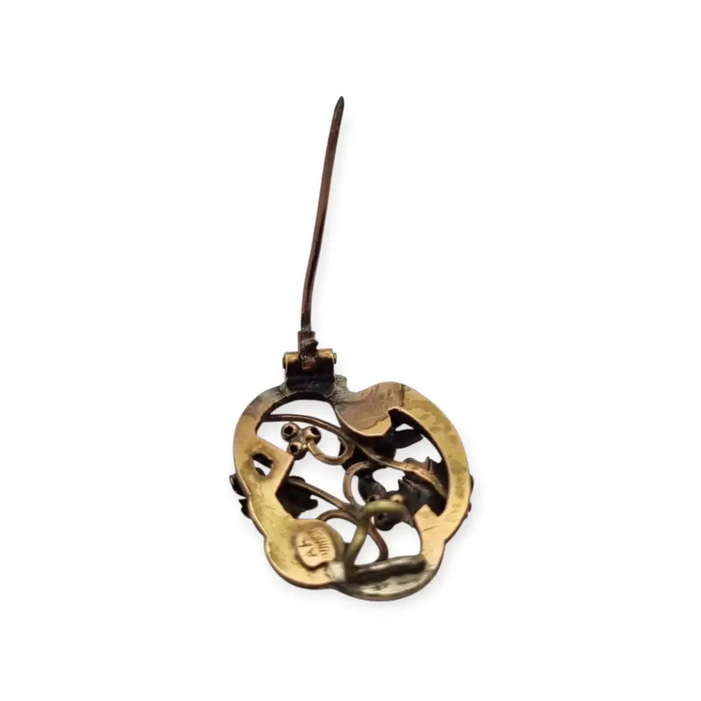Broche Art Nouveau floral en oro laminado y rosa con granates el sello