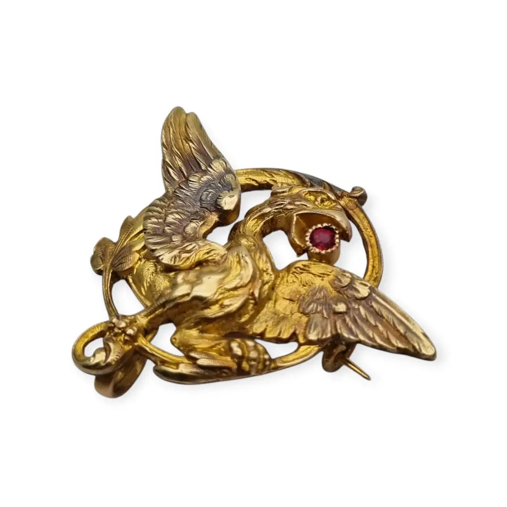 Broche Art Nouveau de grifo mitológico o dragón ORIA Oro relleno y rubí