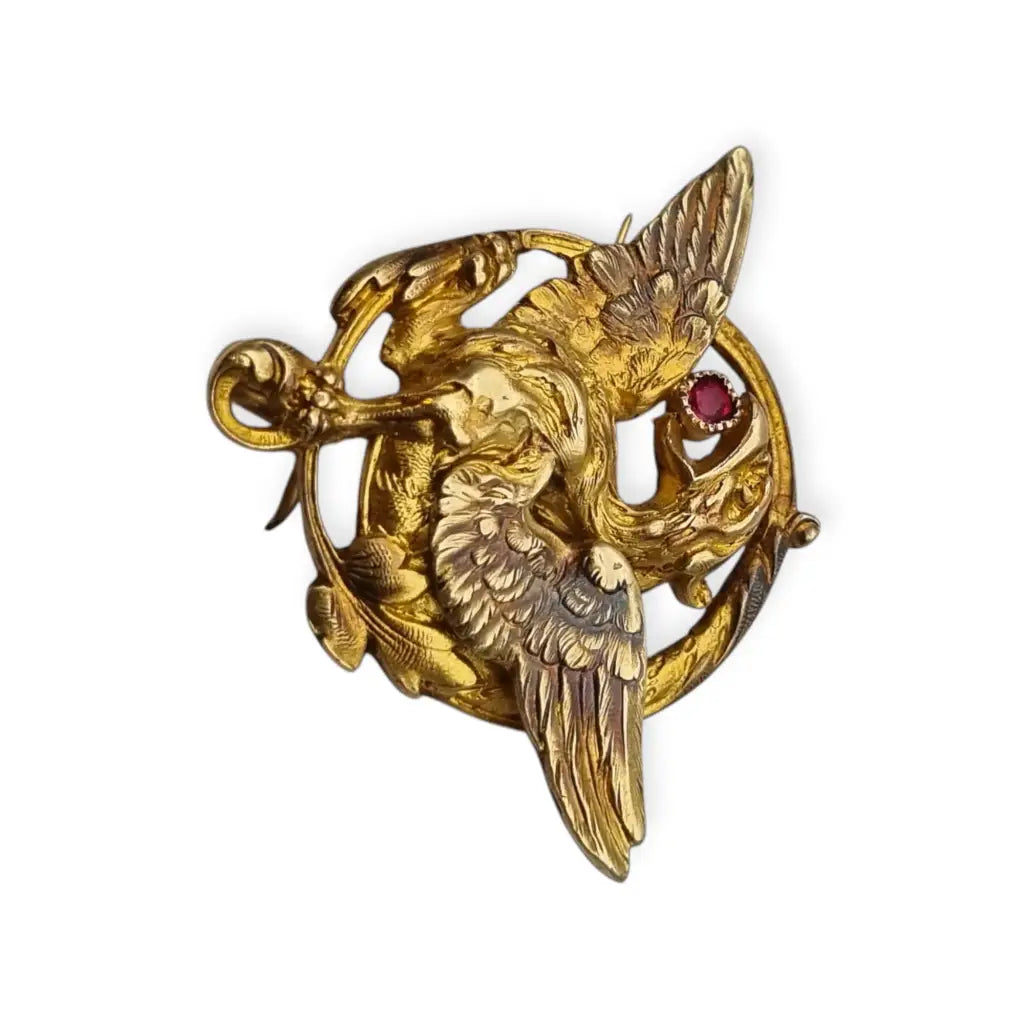 Broche Art Nouveau de grifo mitológico o dragón ORIA Oro relleno y rubí