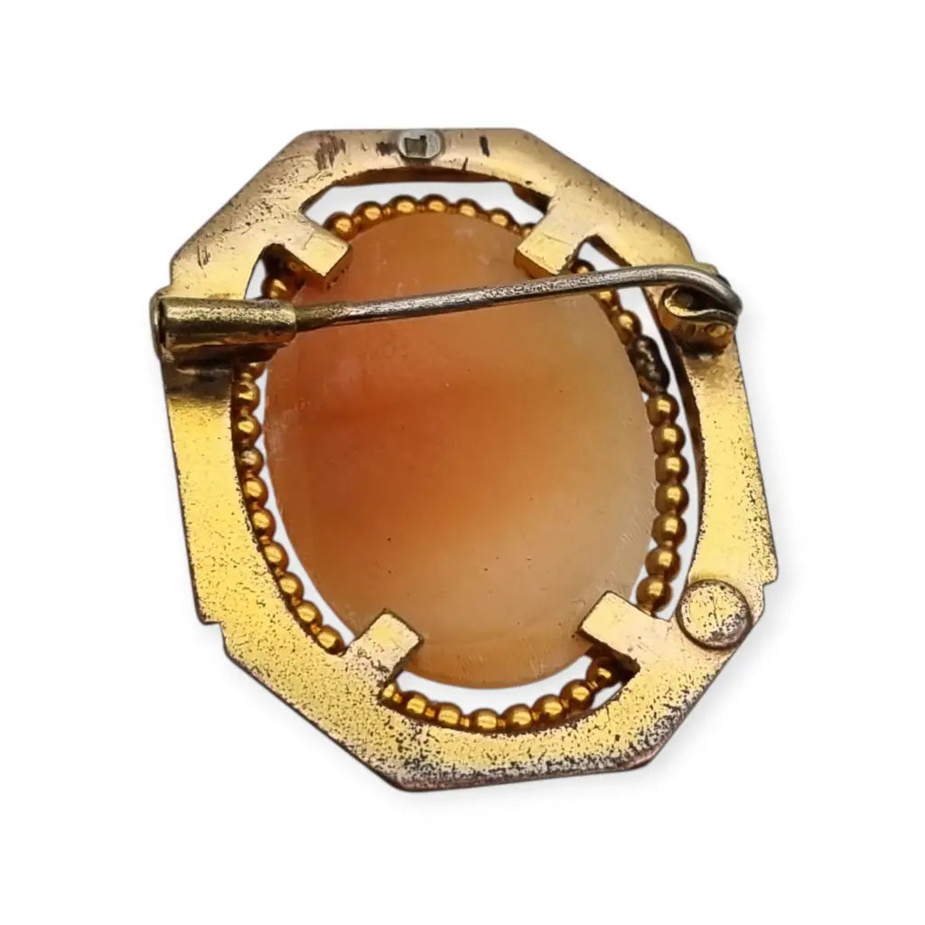 Broche camafeo vintage con perfil femenino en relieve marco geométrico Art Déco