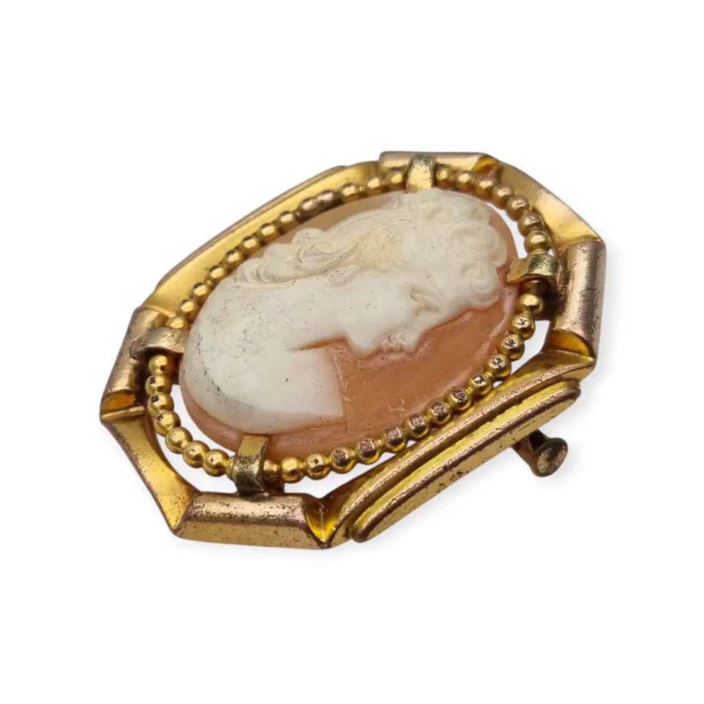 Broche camafeo vintage con perfil femenino en relieve marco geométrico Art Déco