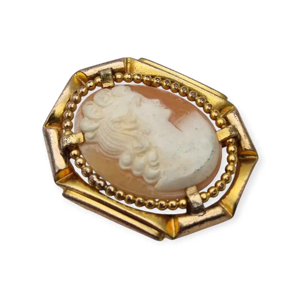 Broche camafeo vintage con perfil femenino en relieve marco geométrico Art Déco