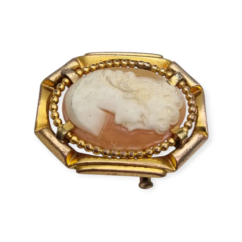 Broche camafeo vintage con perfil femenino en relieve marco geométrico Art Déco