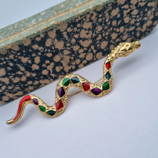 Broche grande de serpiente dorada con pedrería colores para mujer. Un regalo