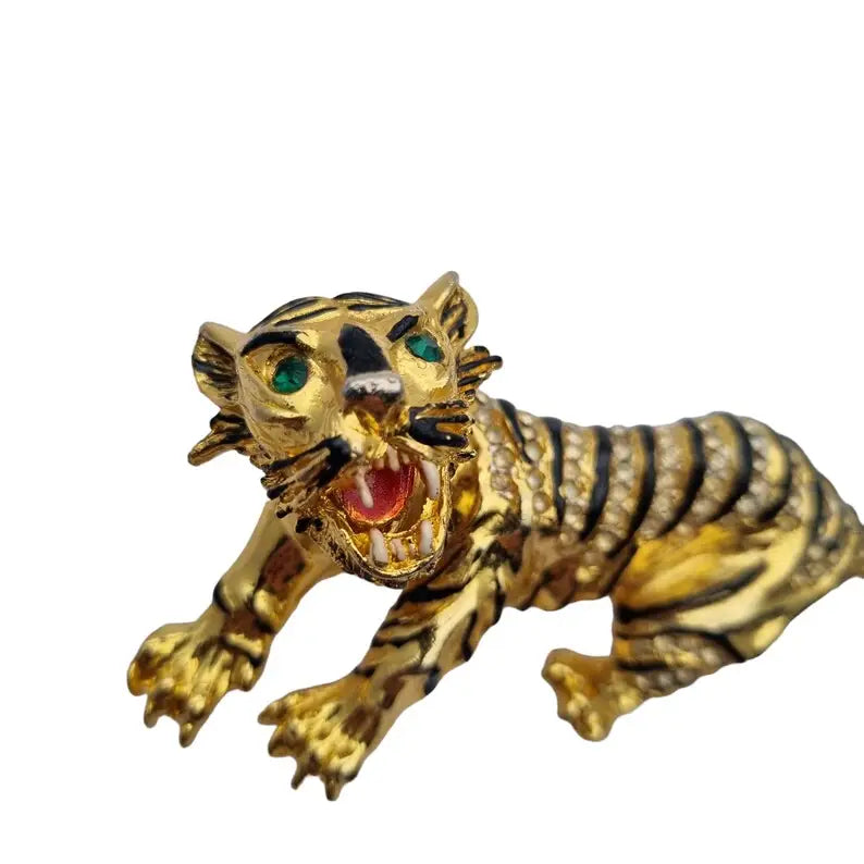Broche pantera dorada con pedrería verde y esmalte negro para amantes