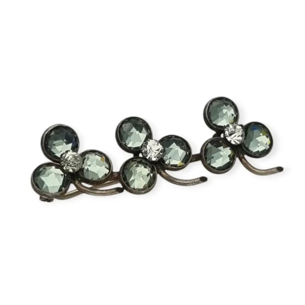 Broche Victoriano antiguo de trébol en plata símbolo buena suerte 1900.