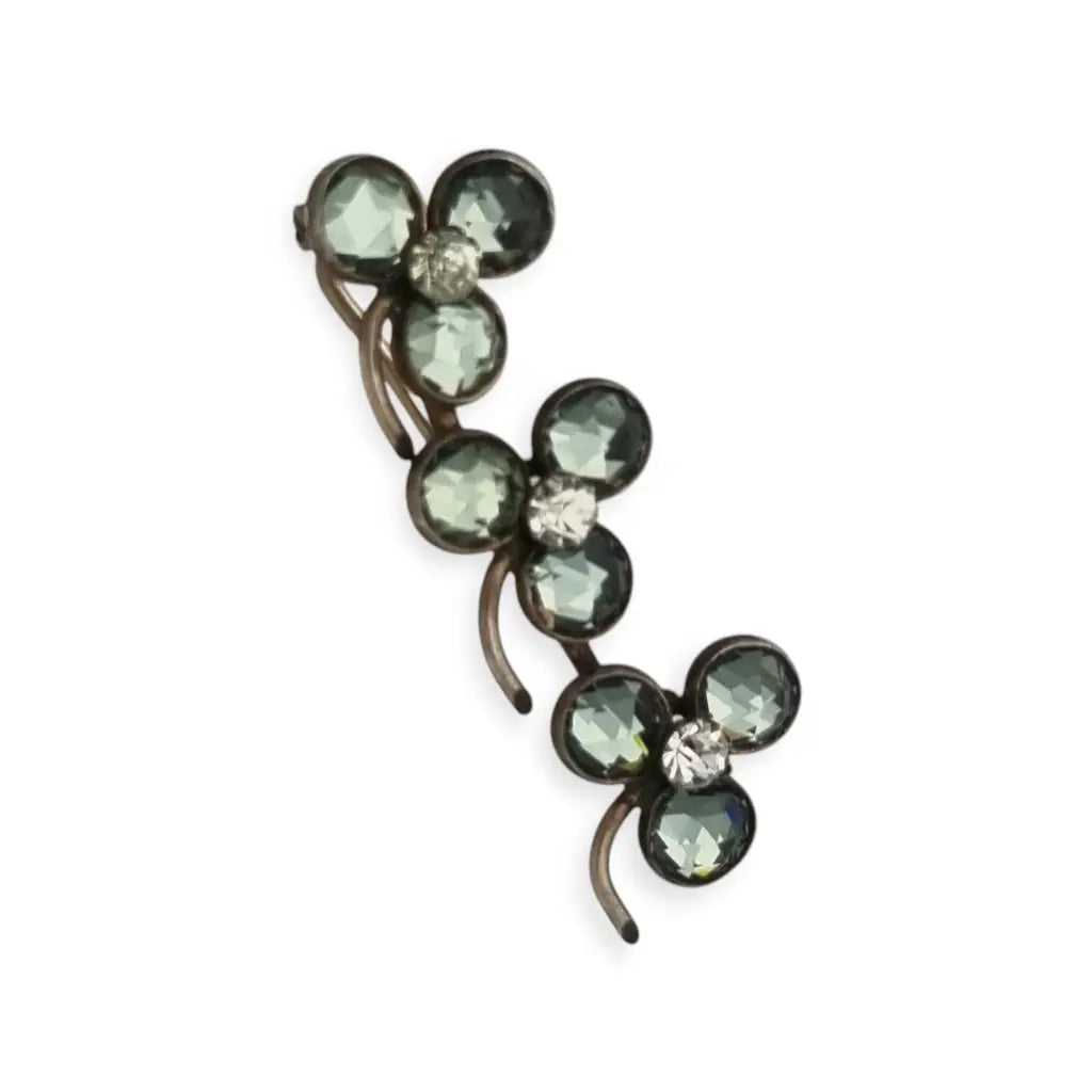 Broche Victoriano antiguo de trébol en plata símbolo buena suerte 1900.