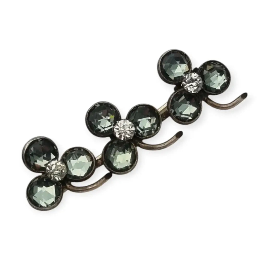 Broche Victoriano antiguo de trébol en plata símbolo buena suerte 1900.