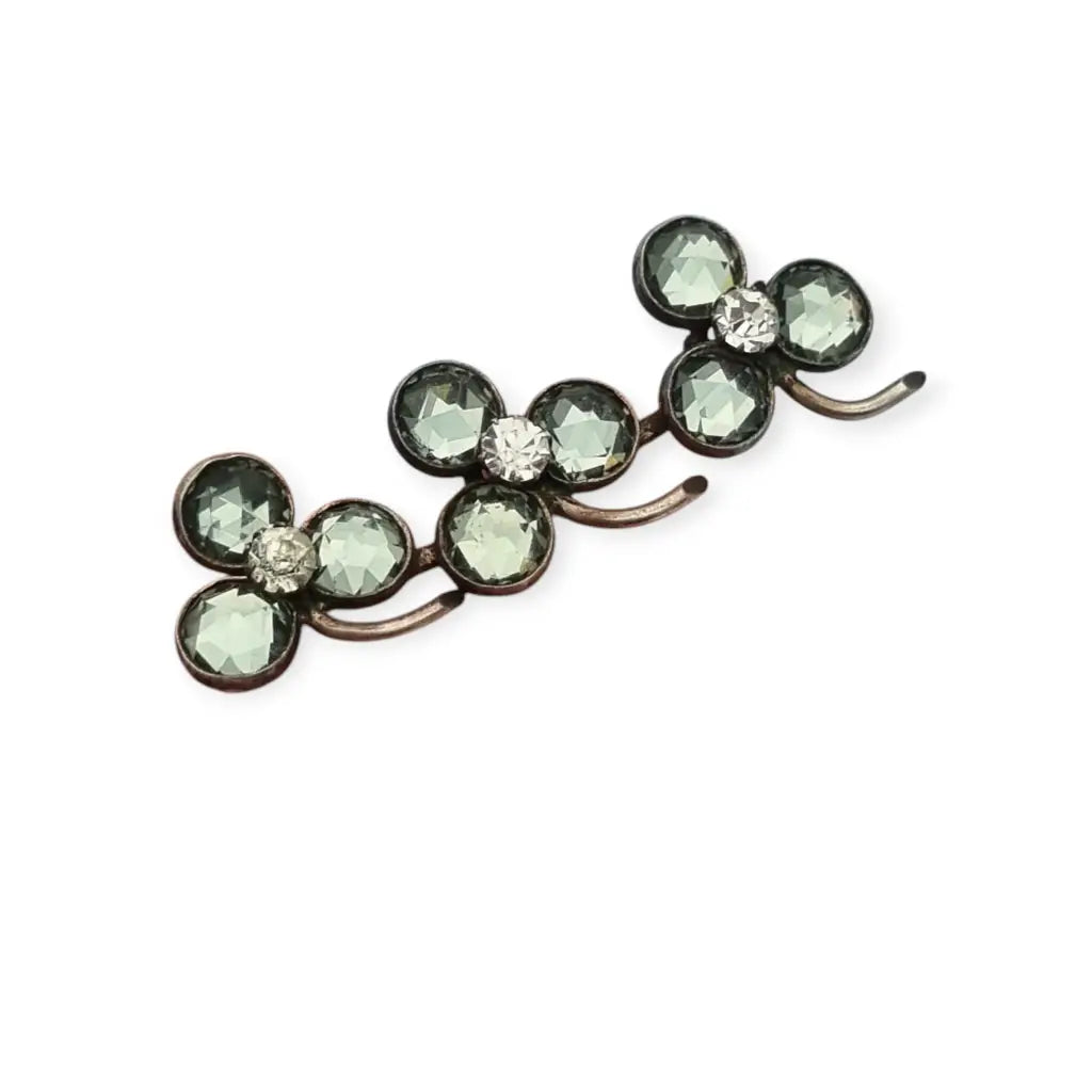 Broche Victoriano antiguo de trébol en plata símbolo buena suerte 1900.