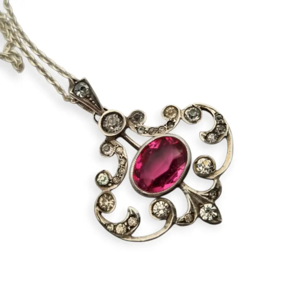 Colgante Belle Époque en plata 800 con cristal rosa y blanco diseño calado