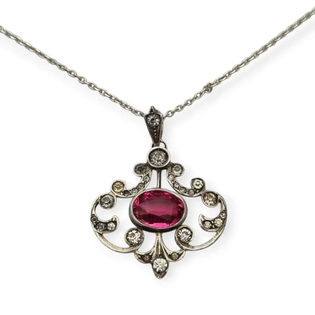 Colgante Belle Époque en plata 800 con cristal rosa y blanco diseño calado
