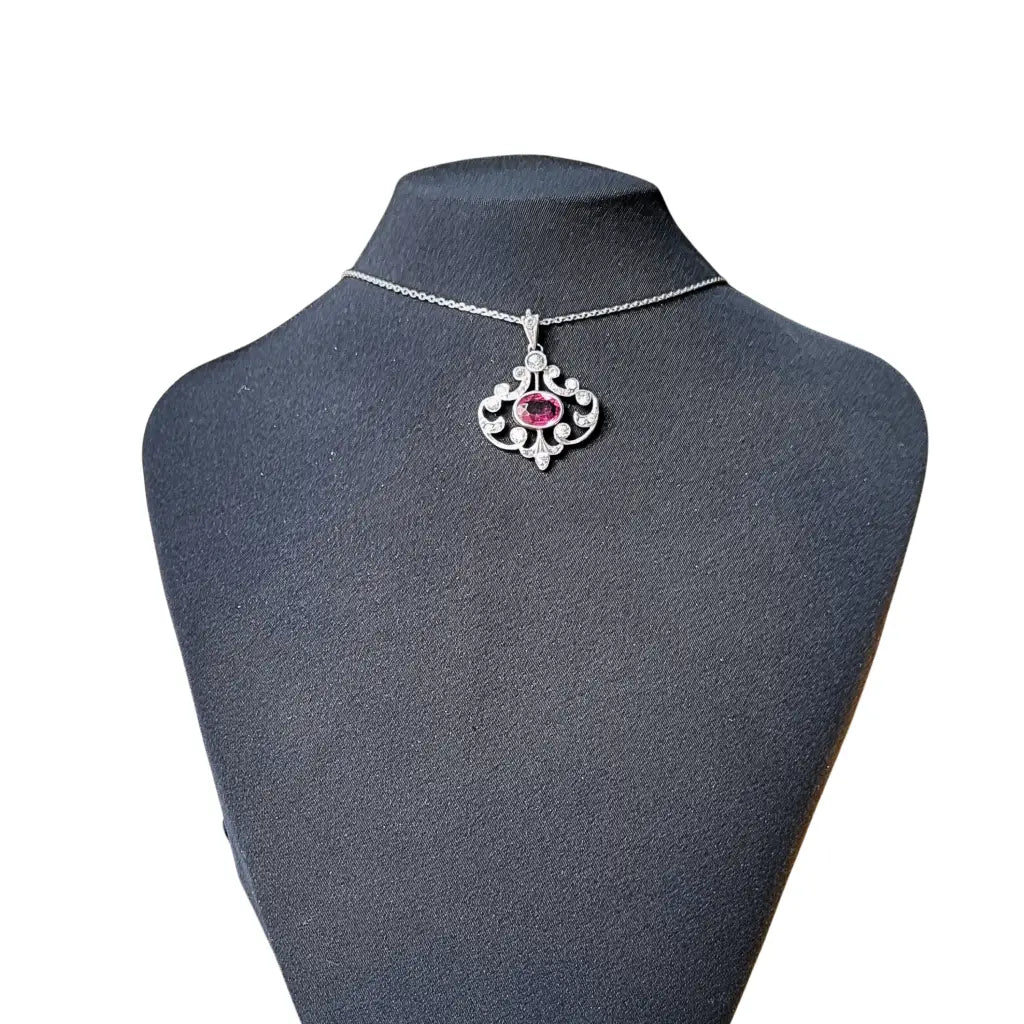 Colgante Belle Époque en plata 800 con cristal rosa y blanco diseño calado