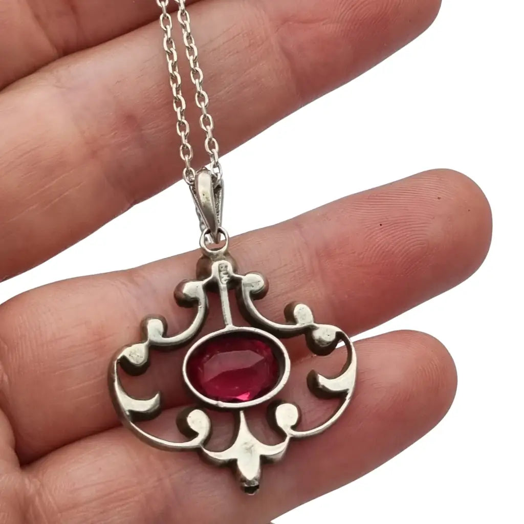 Colgante Belle Époque en plata 800 con cristal rosa y blanco diseño calado