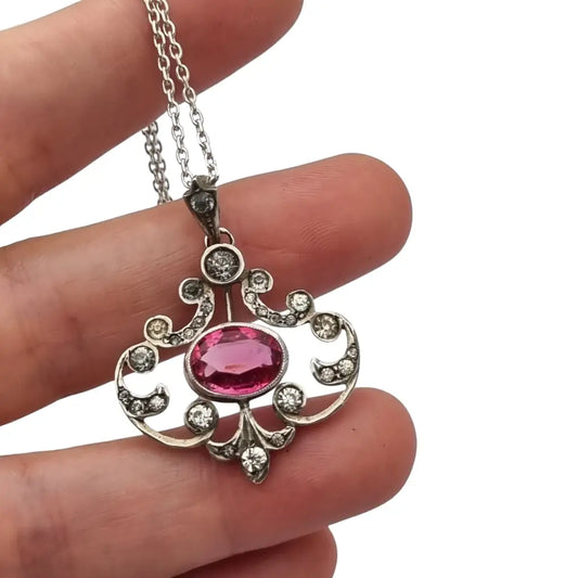 Colgante Belle Époque en plata 800 con cristal rosa y blanco diseño calado