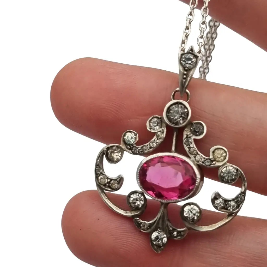 Colgante Belle Époque en plata 800 con cristal rosa y blanco diseño calado