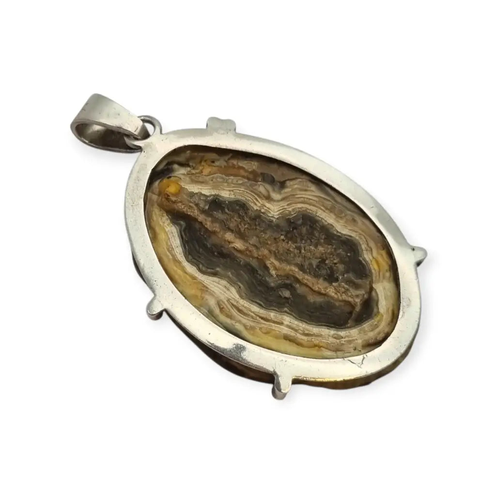 Colgante boho vintage en plata con drusa natural ovalada,| Circa 1970.