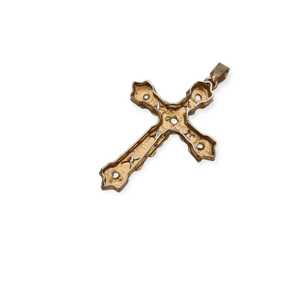 Colgante religioso de cruz Art Decó en metal dorado con pedrería años 20.