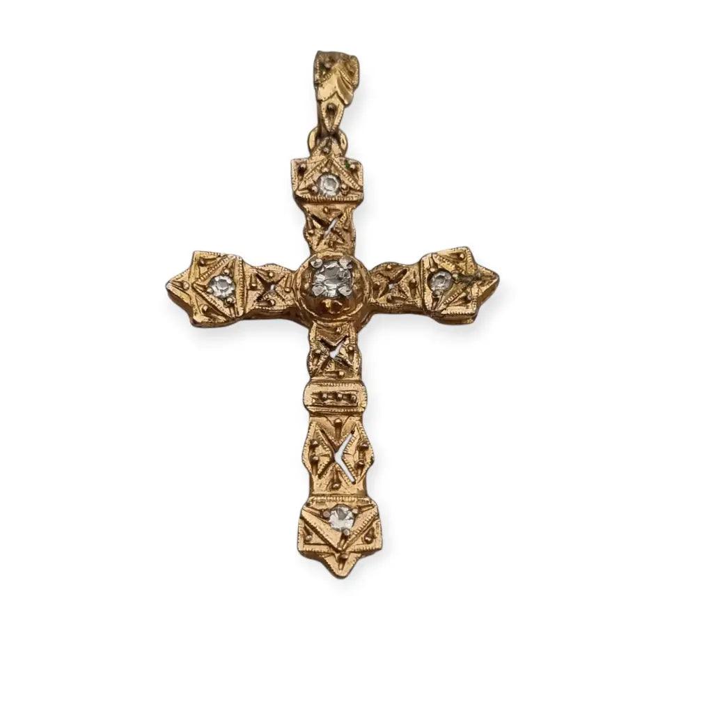 Colgante religioso de cruz Art Decó en metal dorado con pedrería años 20.