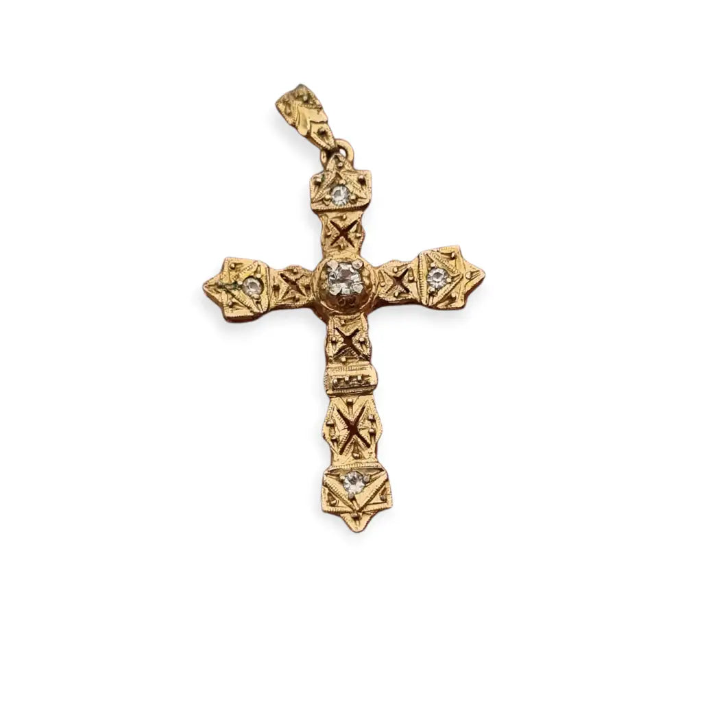 Colgante religioso de cruz Art Decó en metal dorado con pedrería años 20.