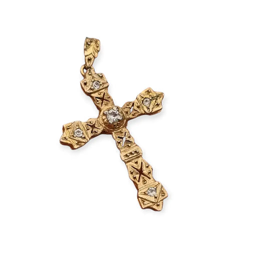 Colgante religioso de cruz Art Decó en metal dorado con pedrería años 20.