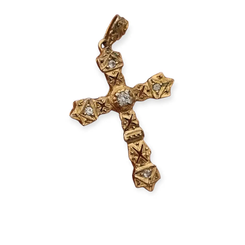 Colgante religioso de cruz Art Decó en metal dorado con pedrería años 20.