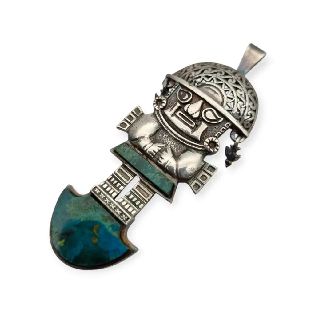 Colgante Tumi de plata y turquesa joyeria étnica peruana andina regalos boho.