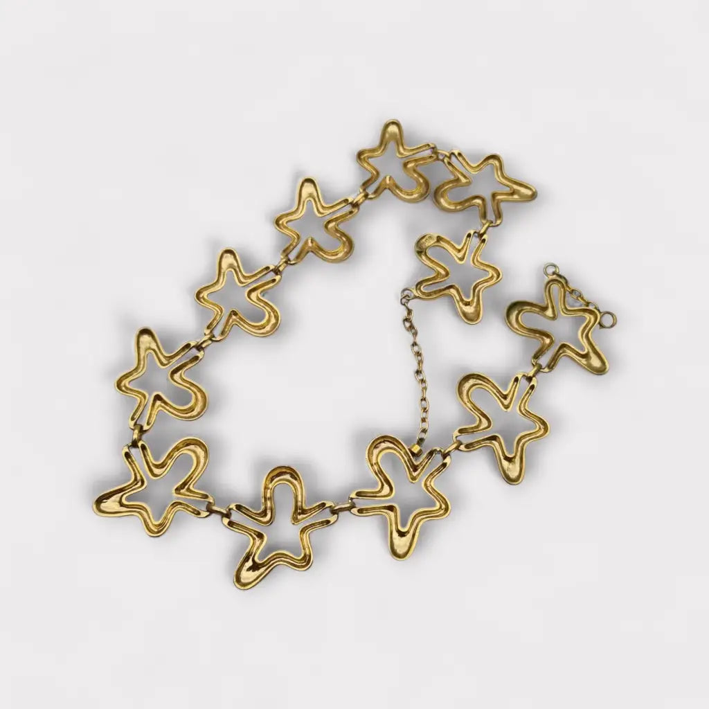 Collar vintage Orena Paris de los años 80 y 90 diseño estrella abstracta