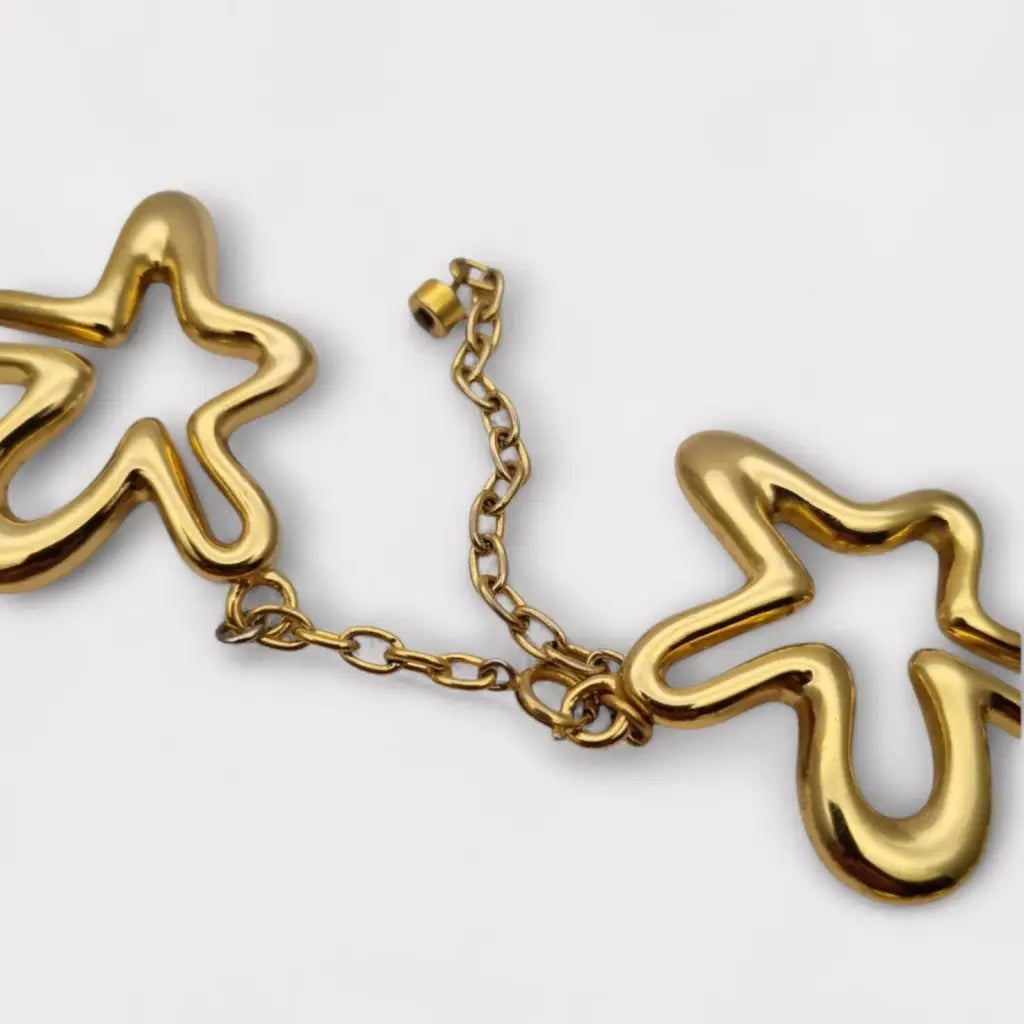 Collar vintage Orena Paris de los años 80 y 90 diseño estrella abstracta