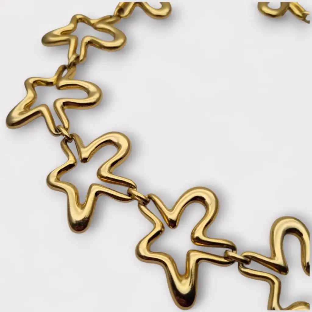 Collar vintage Orena Paris de los años 80 y 90 diseño estrella abstracta