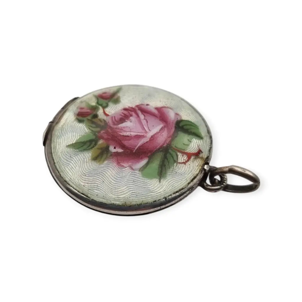 Guardapelo de plata 800 con esmalte guilloché floral rosa y azul joyería